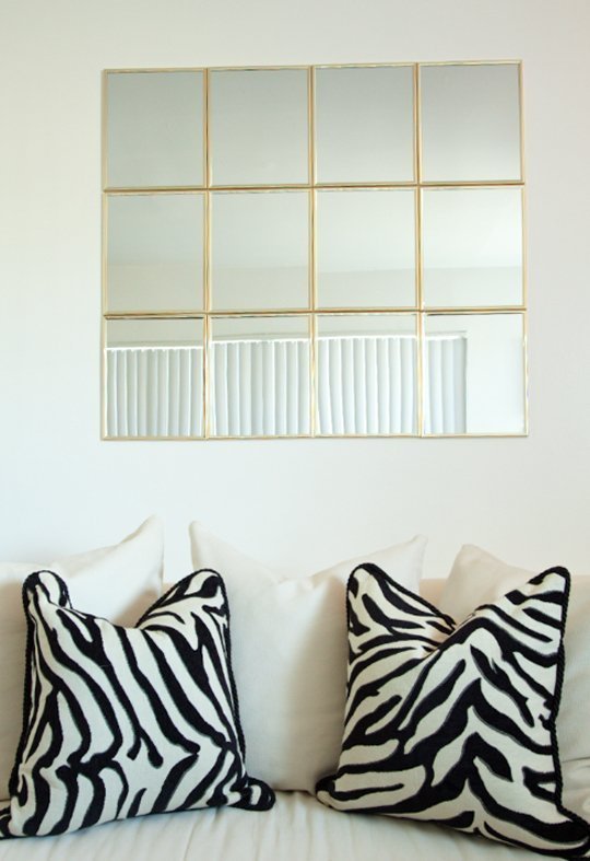 Use Adhesive Strips to Decorate without Marring Walls